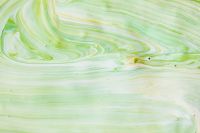Kaboompics - Light Green and White Marbled Texture with Flowing Lines for Soft Abstract Backdrops