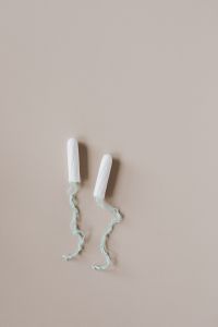 Kaboompics - Top-Down Menstrual Hygiene Photo of Two Tampons on Beige
