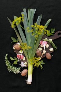 Kaboompics - Leek, Herbs, Garlic and Potatoes on a Black Background