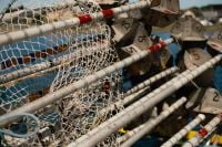 Kaboompics - Fishing Net Floats Stacked at Harbor
