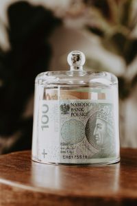 Kaboompics - 100 Polish Zloty Banknote Displayed Inside a Glass Jar, Savings Concept