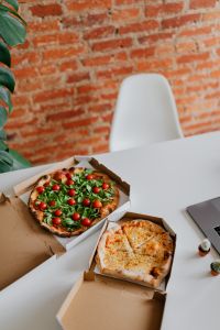 A workplace full of pizza