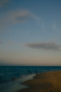 Kaboompics - Blurred Sea Sandy Beach Blue Sky Background