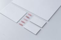 Kaboompics - Little sheets of paper with pink paper clips