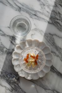 Kaboompics - Overhead Crystal Bowl of Supplements on Marble