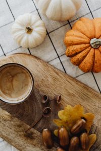 Kaboompics - Coffee Acorns and Oak Leaves on a Wooden Board