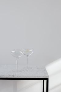 Kaboompics - Elegant Champagne Glasses on Sunlit Marble