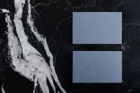 Kaboompics - Blue Business Card Mockup on Dramatic Black Marble, Minimal Branding Flat Lay