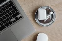 Kaboompics - Top View of Laptop, AirPods and Mouse on Desk