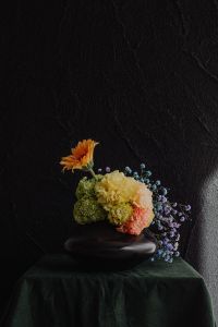 Kaboompics - Moody Colorful Flower Arrangement on Black Background