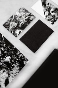 Kaboompics - Black & white mockup business brand template on marble background