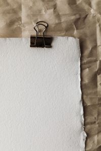 Kaboompics - Vertical Paper Mockup With Binder Clip