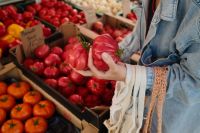 Kaboompics - Woman Shopping for Tomatoes at a Farmers Market