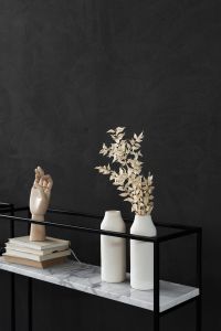 Kaboompics - Wooden Hand Sculpture and Ceramic Vases Styled on Marble Console Shelves