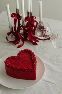 Kaboompics - Candlelit Valentine's Table with Crystal Glasses and Red Accents