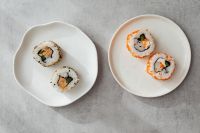 Kaboompics - Two-Plate Sushi Assortment with Sesame and Tobiko Maki