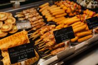 Kaboompics - Spanish Tapas Counter with Skewers and Savory Pastries