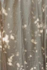 Kaboompics - Beige Linen Curtain Texture with Soft Shadows