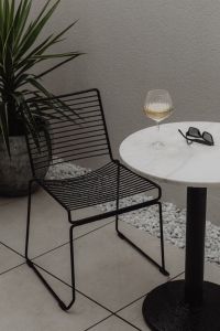 Rainy Day Patio Lifestyle With Coffee and Wine