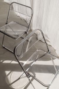 Kaboompics - Clear Chrome Folding Chairs in Sunlit Living Room