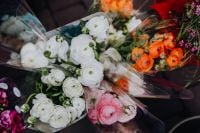 Kaboompics - Colorful Wrapped Ranunculus Bouquets Ready for Sale