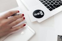Kaboompics - Top View of Laptop, Typography Card, Hand and Mobile Phone