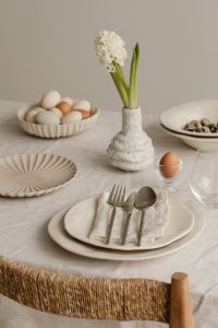 Kaboompics - Neutral Easter Table With White Flower And Pastel Eggs