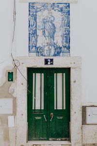 Kaboompics - Colorful wooden door in the facade of a typical Portuguese house at Lisbon, Portugal