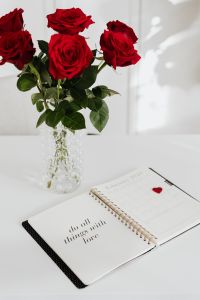 Kaboompics - February Weekly Planner with Red Roses and Felt Heart, Valentine's Day Desk