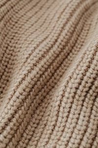 Kaboompics - Beige Ribbed Knit Close-Up