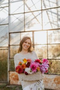 Kaboompics - Woman Posing With Colorful Dahlia Bouquet