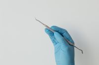Kaboompics - Dental Explorer Probe Held for Oral Examination