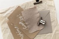 Kaboompics - Handwritten Good Day Card with Kraft Envelope and Gray Paper