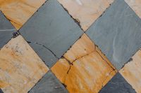 Kaboompics - Gray Diamond Marble Tile Framed by Ochre Stone Slabs, Naples Italy Floor Texture