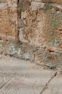 Kaboompics - Weathered Multicolor Stone and Plaster Wall