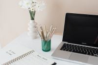 Kaboompics - Color Pencils, White Flowers and Laptop for Creative Home Office