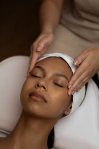Kaboompics - Woman Receiving Facial Massage with Headband