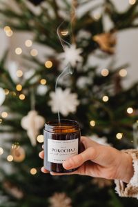 Kaboompics - Amber Candle in Warm Christmas Tree Bokeh