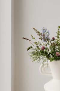 Kaboompics - White Ceramic Vase with Wildflowers and Right Copy Space
