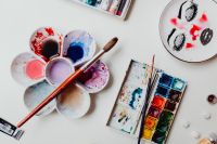 Kaboompics - A woman paints with watercolors