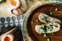 Kaboompics - Breakfast served with tea, bread and eggs