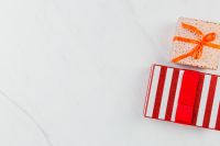 Kaboompics - Red and Orange Wrapped Christmas Gifts with Copy Space