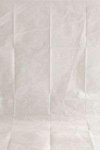 Kaboompics - White Folded Paper Studio Background