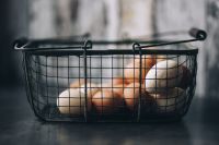 Kaboompics - Metal wire basket with eggs