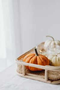 Kaboompics - Close Up of an Orange Pumpkin in a Wicker Tray