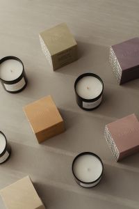 Kaboompics - Overhead Candle and Packaging Arrangement