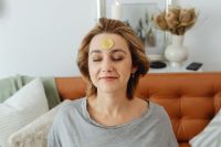 Kaboompics - Woman With Bitcoin Coin on Forehead