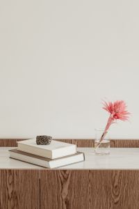 Kaboompics - Books Arranged on a Marble Console