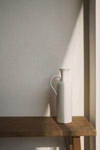 Kaboompics - White Ceramic Vase on Wooden Bench in Window Light