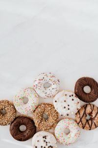 Kaboompics - Various donuts on white marble